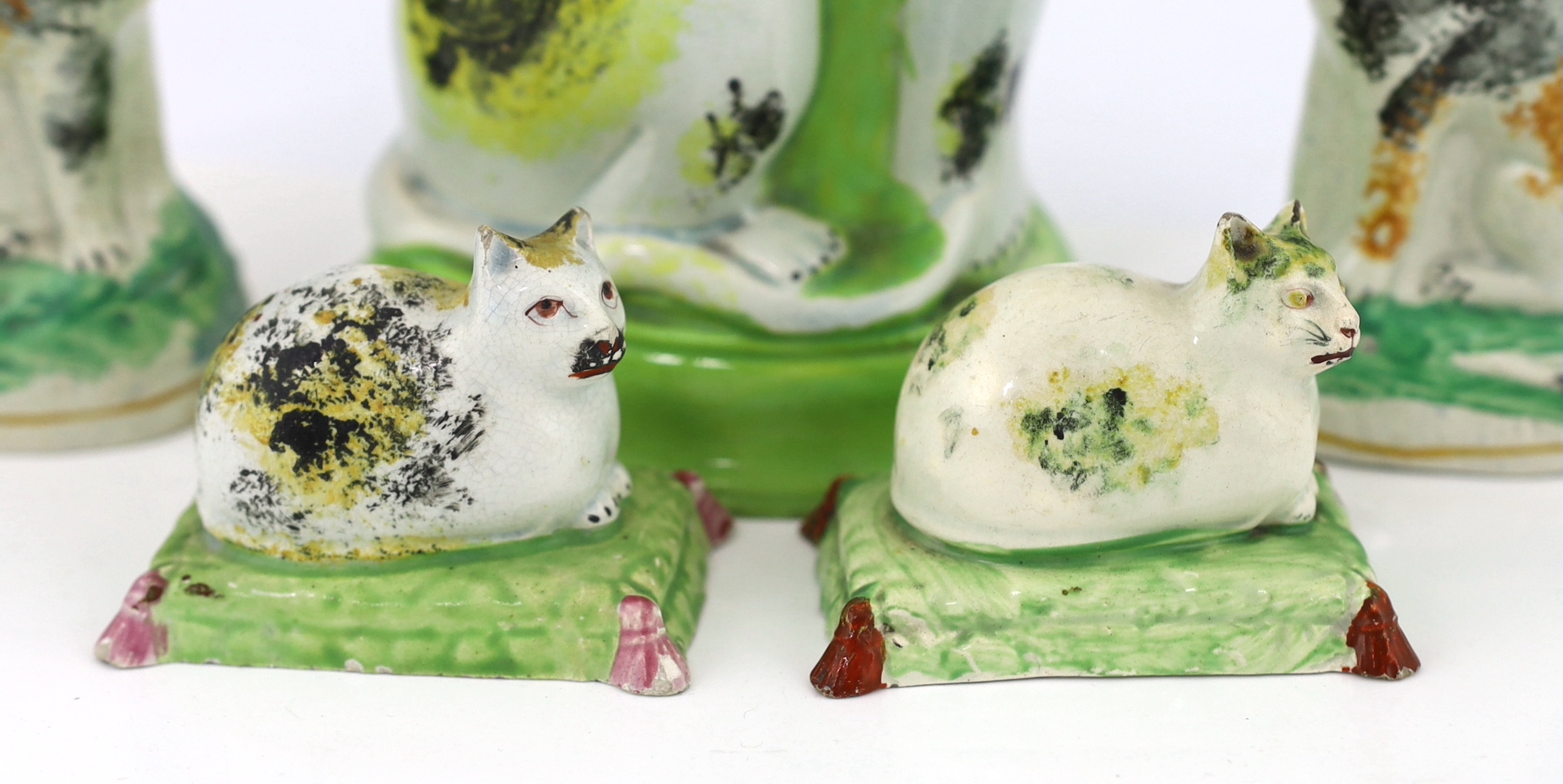 Six Staffordshire pearlware models of cats, early 19th century